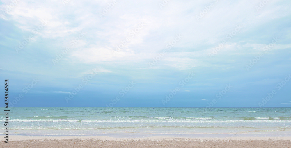 Tropical white sand beach, blue water and blue sky,wild beach background