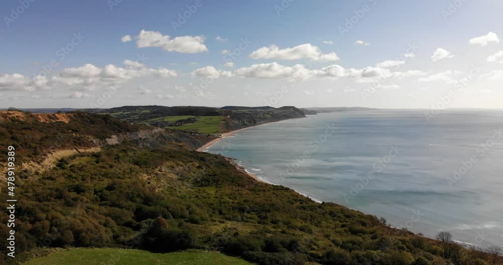 Aerial shot of the Jurassic coast from Lyme Regis looking towards Charmouth on a beautiful summers day Aerial shot of the Jurassic coast from Lyme Regis looking towards Charmouth on a beautiful summers day