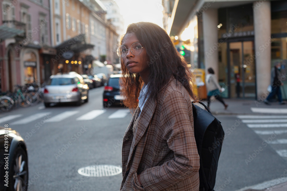 young business woman crossing the road young business woman crossing the road
