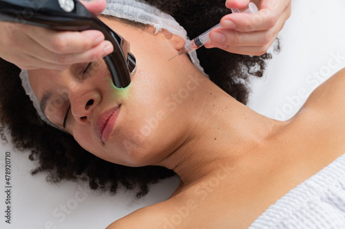 African Woman Having A Facial BeautyTreatment  photo