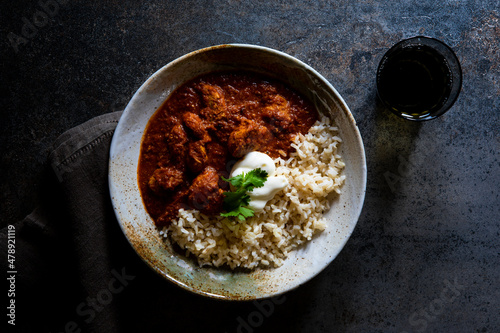 Dark backgound with Indian Chicken Curry photo