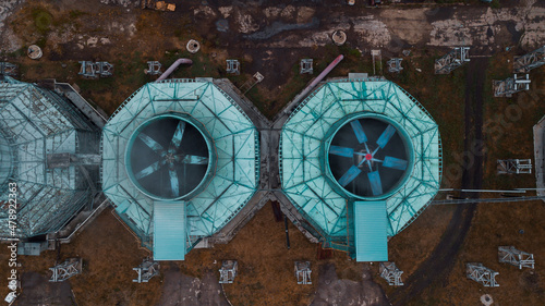 two cooling towers of a chemical plant - aerial view photo