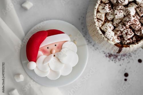 Santa cupcake and mug of hot chocolate