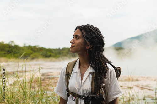 Arab backpacker admiring nature in reserve