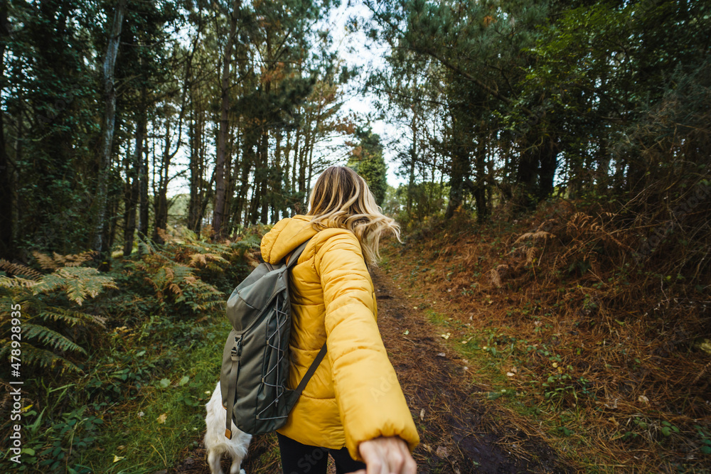 © Daniel Gonzalez/Stocksy - Woman holding hand of man