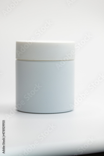 white cosmetic container