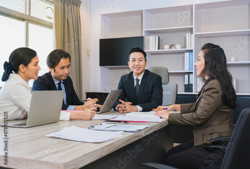 young man manager look happy in professional team meeting