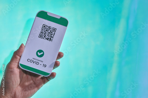 Vaccination passport for COVID-19 displayed on a smartphone