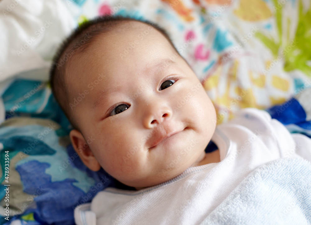 Closeup expression of Asian newborn baby Closeup expression of Asian newborn baby