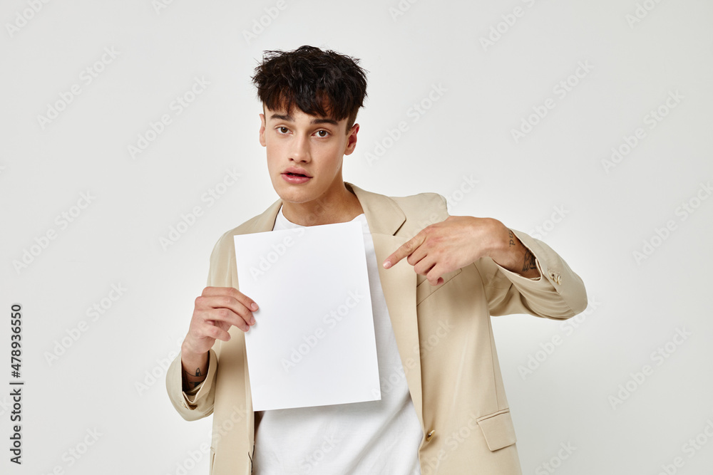 Photo young boyfriend posing jacket emotions copy-space light background unaltered Photo young boyfriend posing jacket emotions copy-space light background unaltered