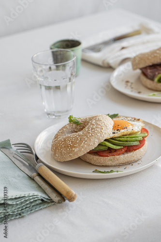 Diferents sandwichs and bagels on the style table. photo