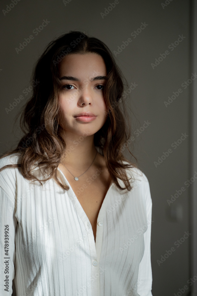 Portrait Of Young Woman Looking At Camera Portrait Of Young Woman Looking At Camera