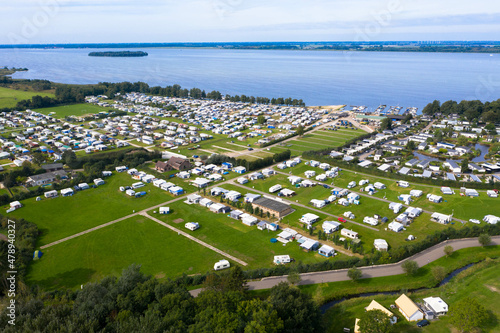 Aerial view of the Europarc Hulshorst campsite on the Veluwemeer near the village of Nunspeed. Gelderland, Netherlands. Traditional vacation in Holland. Drone photography. photo