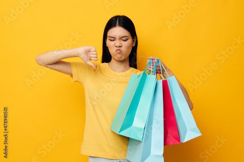 woman with packages in hands shopping isolated background unaltered