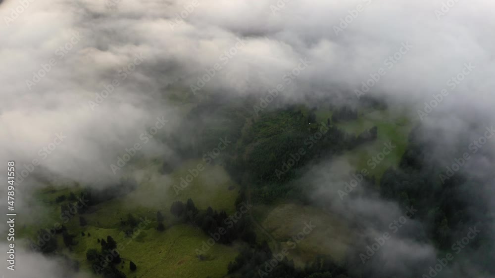 Aerial Forward Beautiful View Of Green Landscape Seen Through White Clouds - Thuringia, Germany Aerial Forward Beautiful View Of Green Landscape Seen Through White Clouds - Thuringia, Germany