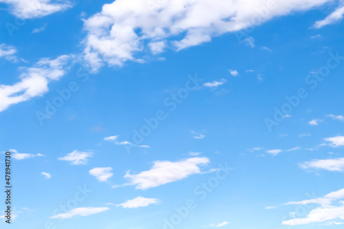 Bluesky with clouds on bright summer background