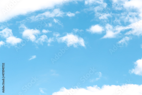 Clouds soft patterns on bright blue sky background with space