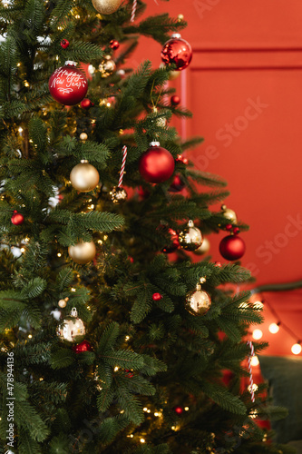 Christmas tree with baubles and garlands