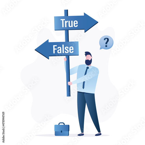 Businessman is holding pointers - true and false. Manager is thinking about choosing the right direction. Business development, successful career.