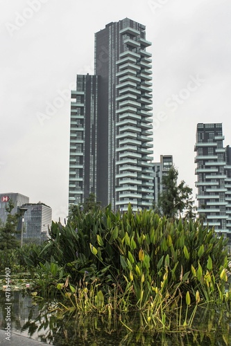 2019.12.27 Milan, Italy, Piazza Gae Aulenti, evocative image of the
city skyline at dusk photo