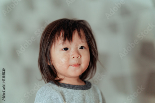 cute little child portrait on bed