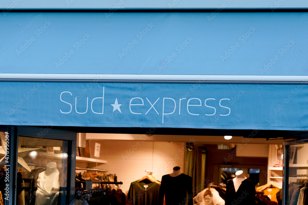 sud express text sign and logo brand on flag boutique entrance store facade  of french fashion shop Stock Photo | Adobe Stock