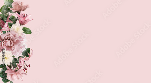 Floral border banner, header with copy space. Roses and lily isolated on pink background. Natural flowers wallpaper or greeting card. © RinaM