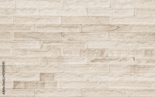 Cream and white brick wall texture background. Brickwork and stonework flooring interior rock old pattern old vintage brick wall backdrop decoration