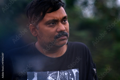 Portrait of a middle aged man at outdoors photo