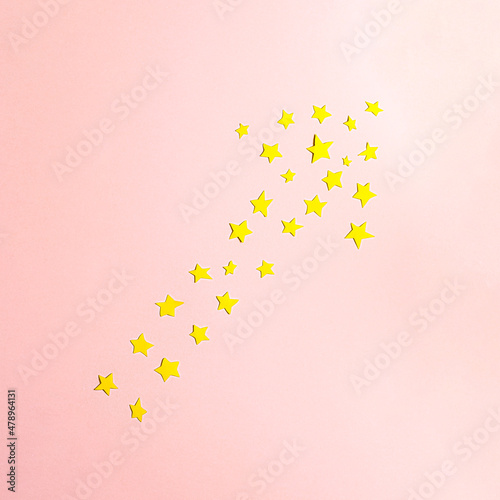 Yellow stars arranged in an arrow showing success