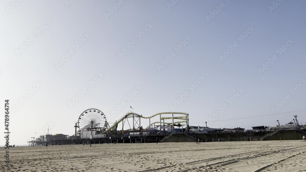 View of Santa Monica Pier from the beach far away California View of Santa Monica Pier from the beach far away California