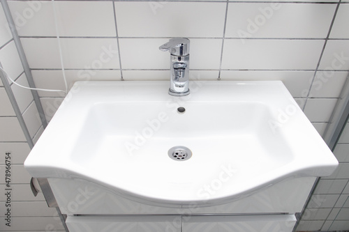 White ceramic sink in the bathroom