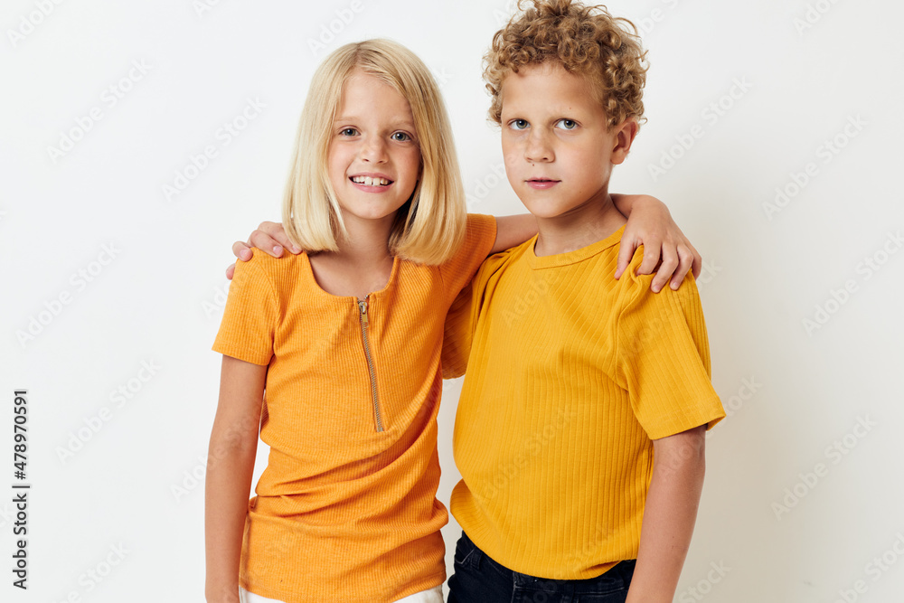 Cute stylish kids casual wear games fun together posing emotions quarrel light background unaltered Cute stylish kids casual wear games fun together posing emotions quarrel light background unaltered