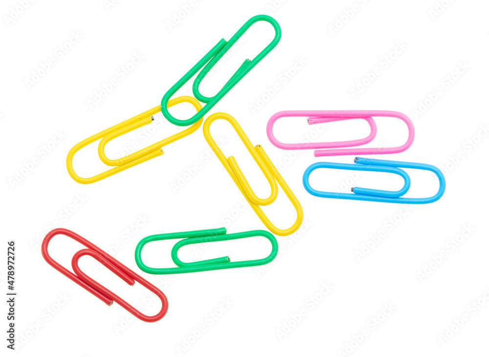 Multi-colored paper clips isolated on a white Multi-colored paper clips isolated on a white