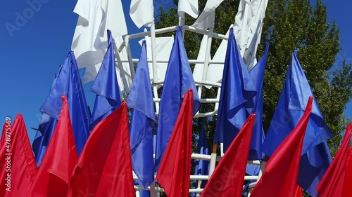 Wallpaper Mural Russia. National country flag on blue sky background. Flying fabric symbol. Tourism or travel summer day. international patriotic emblem. Nobody. Horizontal slow motion video. Many flagpole Torontodigital.ca