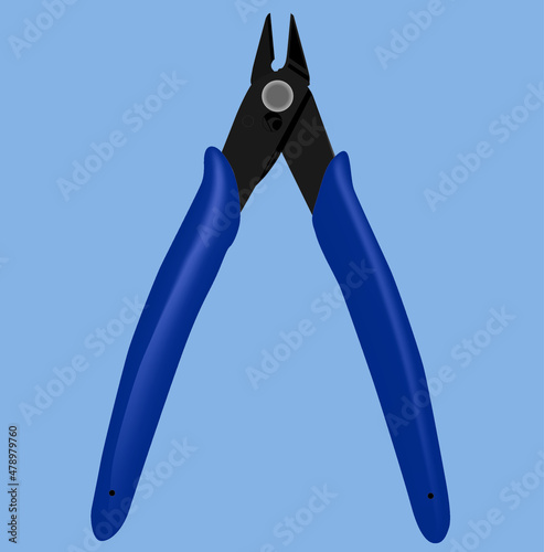 pliers on blue background