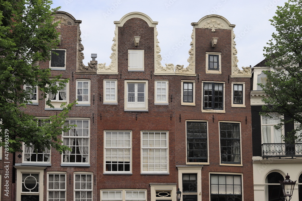 Canal House Facades wth Neck Gables in Amsterdam, Netherlands
