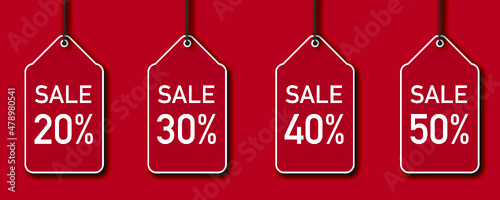 Sale percentage. Red on red background photo