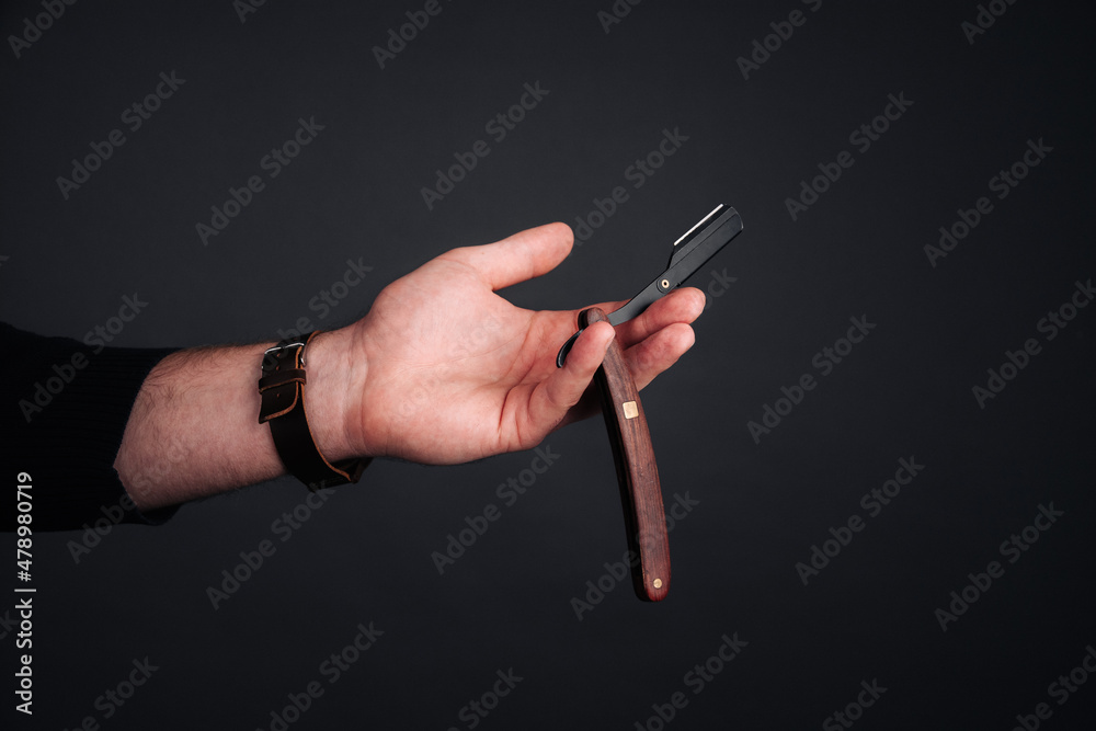 Fototapeta premium hand holding a fork