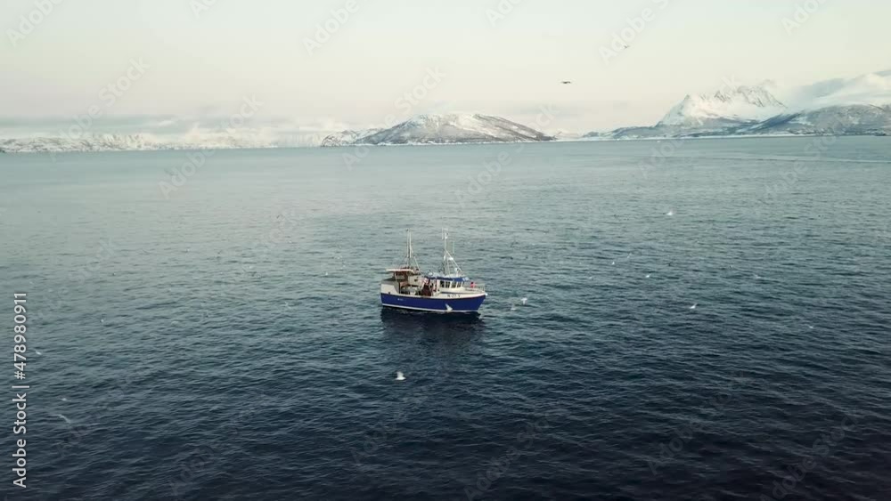 Fishing boat in norway in the arctic sea close to Skjervøy Fishing boat in norway in the arctic sea close to Skjervøy