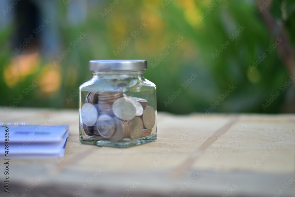 Coin on blur background in save money. Coin on blur background in save money.