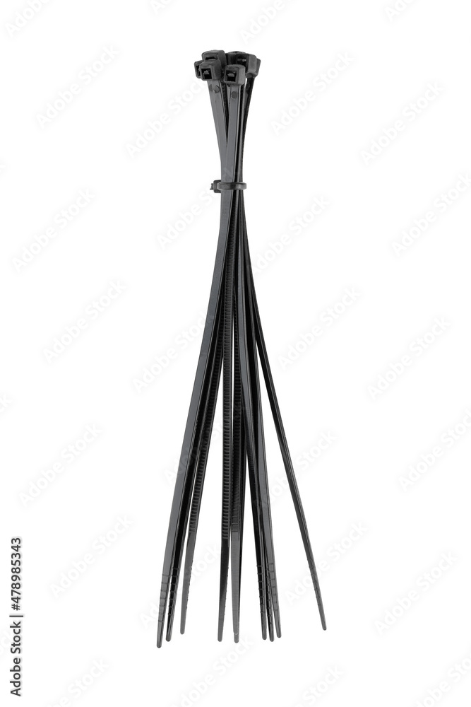 Tie clamps on a white background. Black plastic cable ties clamps close-up. Tie clamps on a white background. Black plastic cable ties clamps close-up.