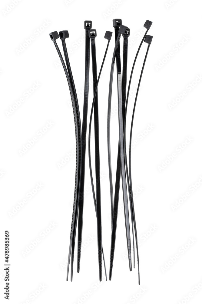 Tie clamps on a white background. Black plastic cable ties clamps close-up. Tie clamps on a white background. Black plastic cable ties clamps close-up.