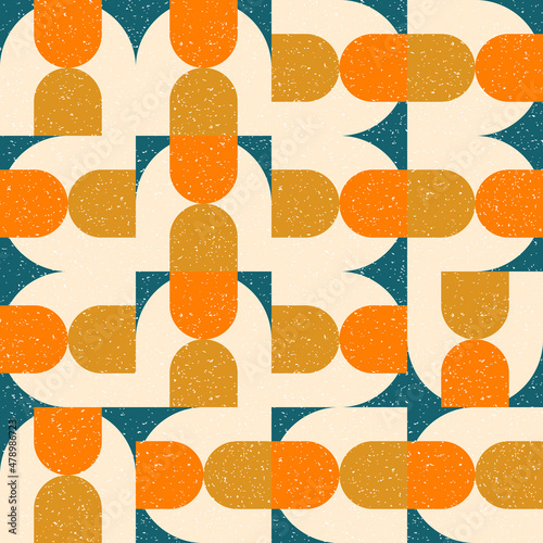 Modern vector abstract seamless geometric pattern with semicircles and circles in retro scandinavian style. Pastel colored simple shapes with separate worn out texture.