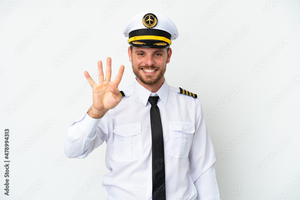 Airplane Brazilian pilot isolated on white background happy and counting four with fingers Airplane Brazilian pilot isolated on white background happy and counting four with fingers