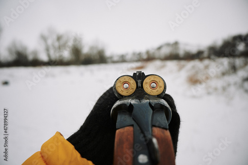 First-person view, 16-gauge double-barreled shotgun