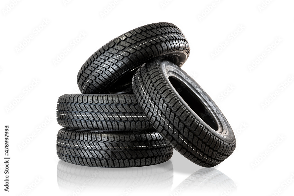 Set of four new tyres on white background. All weather tyres. No logo ...