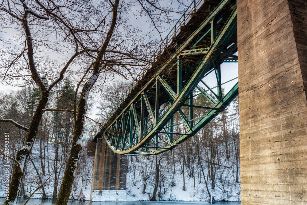 Winter scenery of the railway bridge in Rutki, Kashubia. Poland