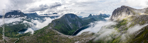 Aerial view of Barden, Breidtinden, Segla mountains and Ornfjord in a sea of clouds, Senja island, Troms county, Norway, Scandinavia photo