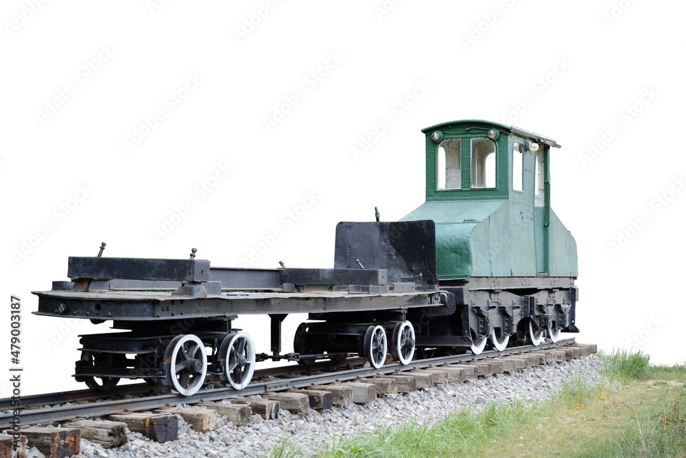Old train (trolley) with gravel and green grass isolated on white background. Old train (trolley) with gravel and green grass isolated on white background.
